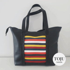 bold stripes, timeless black: the stripe match handbag by toju fashion