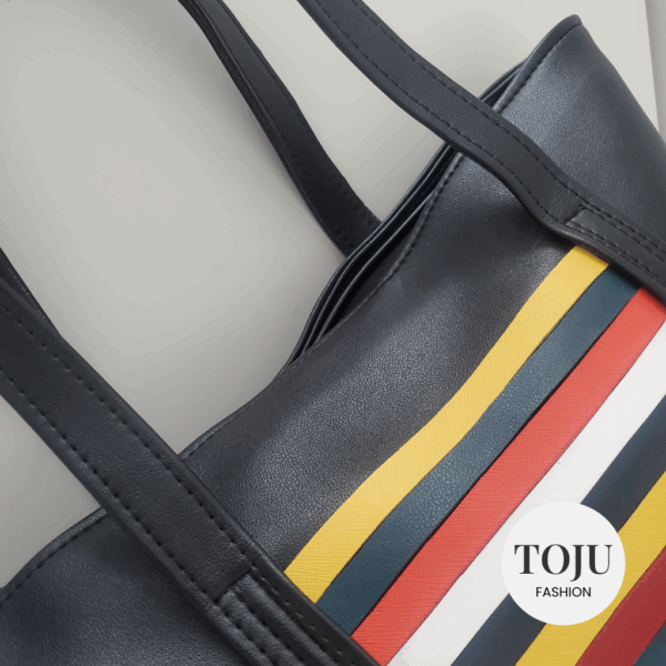 bold stripes, timeless black: the stripe match handbag by toju fashion